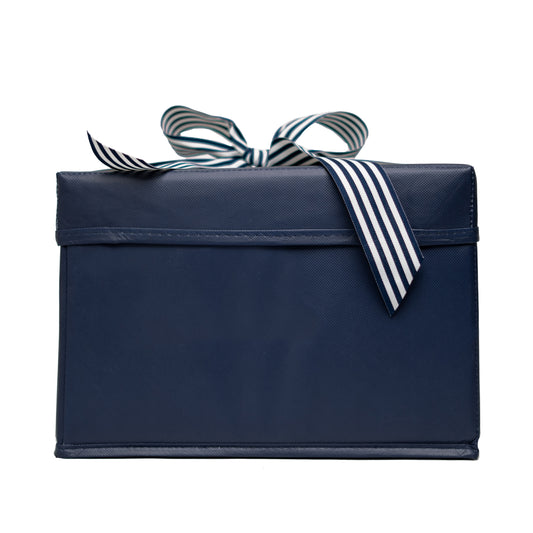Small Shoebox-Sized Blue Collapsible Gift Box with ribbon attached, great zero waste solution for sustainable and eco-friendly gift boxes - EverWrap